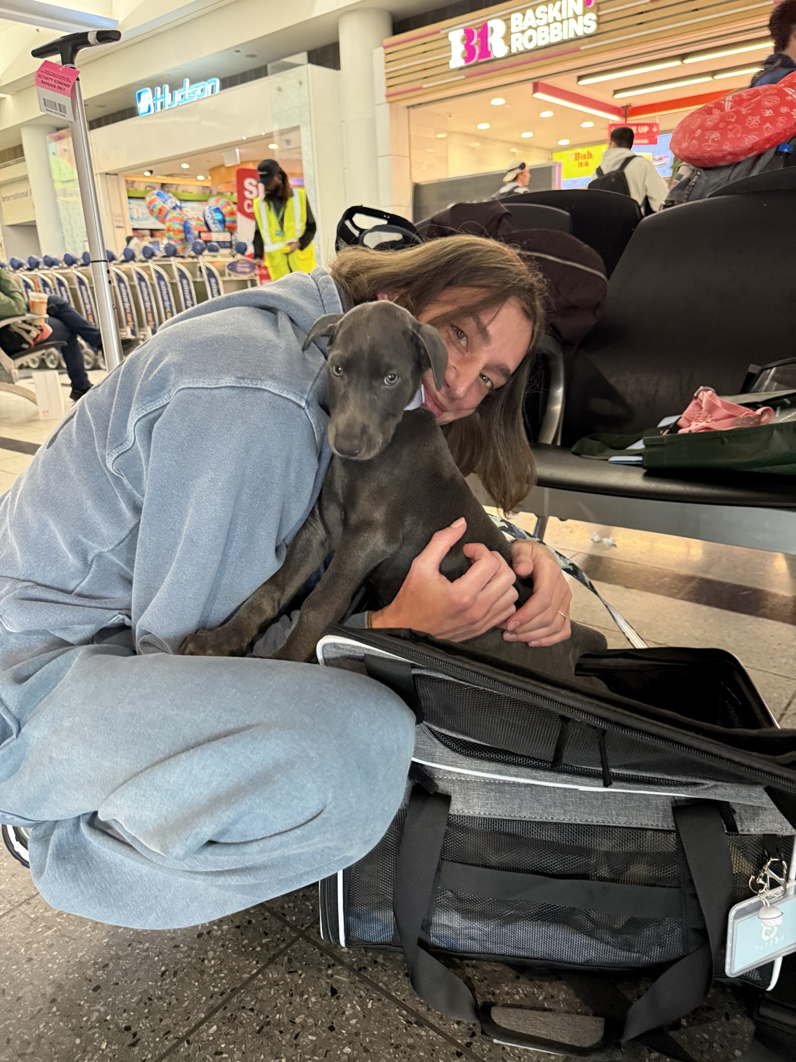 Kaida with her family at the airport on go-home day