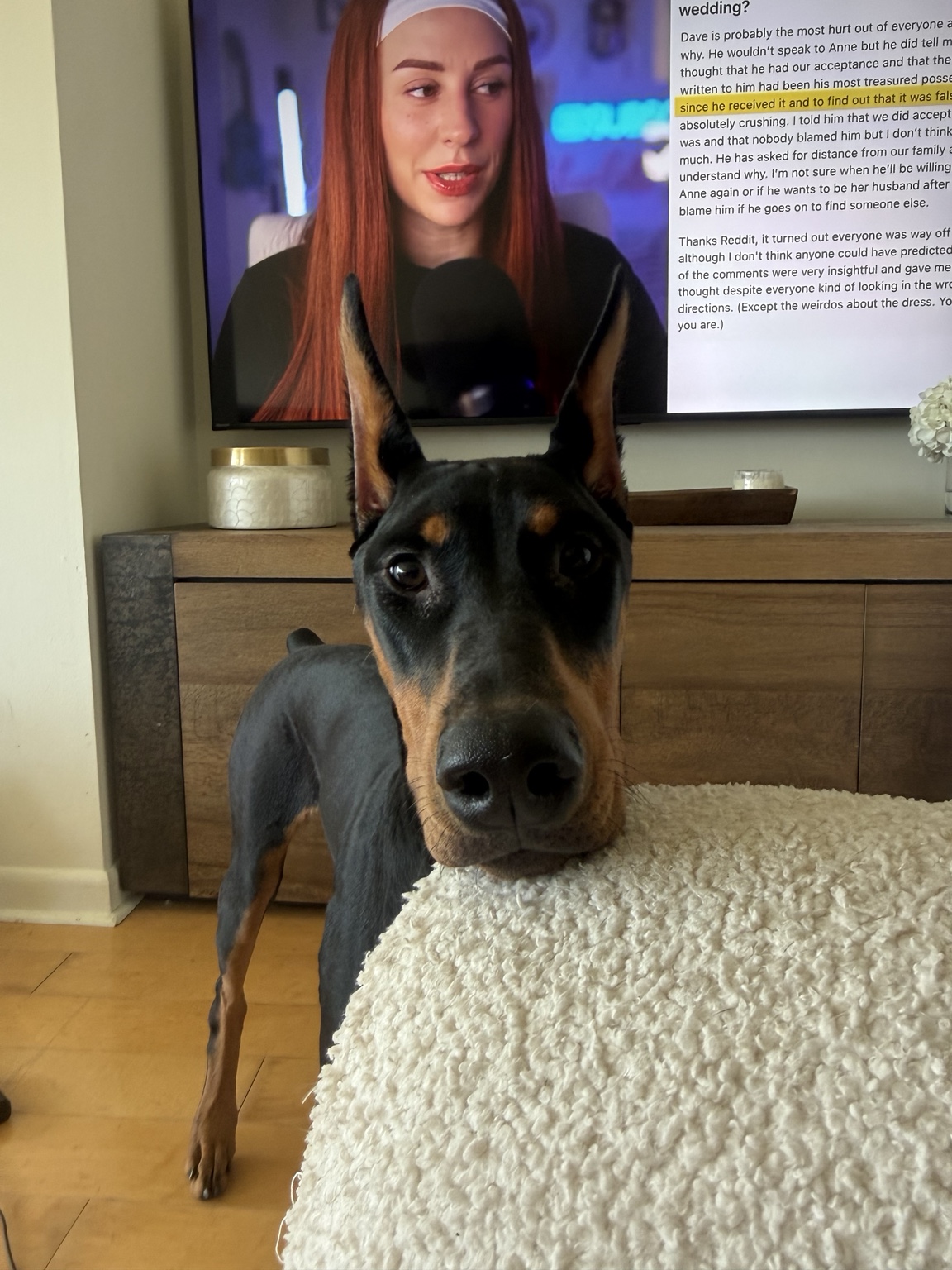 Xena leaning close beside her family